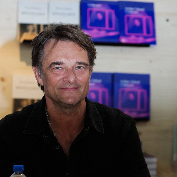David Hallyday dédicace son livre au Festival du livre de Paris, au Grand Palais éphémère, le 14 avril 2024. 

Photo de Thibaud MORITZ/ABACAPRESS.COM