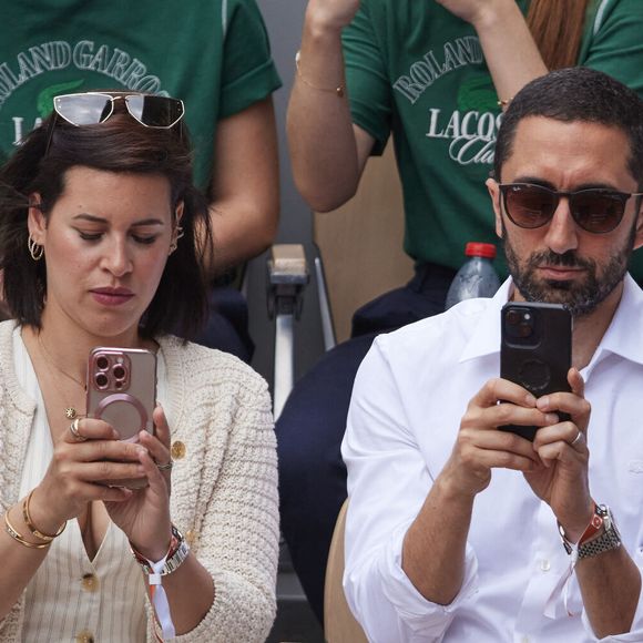 Jimmy Mohamed et sa femme Souailla - Célébrités dans les tribunes des Internationaux de France de tennis de Roland Garros 2024 à Paris le 26 mai 2024. © Moreau-Jacovides/Bestimage
