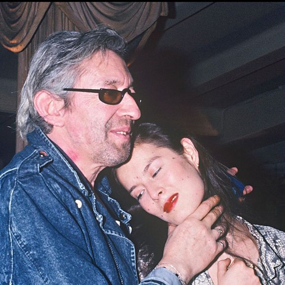 Serge Gainsbourg et Bambou lors d'une soirée au Palace à Paris en 1988 © AGENCE / BESTIMAGE