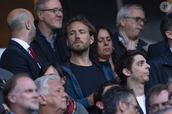 Lucas Pouille - Célébrités dans les tribunes lors du match retour de la Ligue Des Champions 2024-2025 (LDC) "PSG - Arsenal" (2-1) au Parc des Princes à Paris le 7 mai 2025. © Cyril Moreau/Bestimage