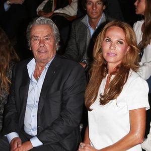 Alexia Niedzielski, Alain Delon et Rosalie Van Breemen au defilé de mode Elie Saab, collection prêt-à-porter printemps-été 2013, Paris le 03 octobre 2012. © Bestimage