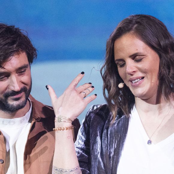Jérémy Frérot, Laure Manaudou enregistrent l'émission "La Chanson secrète 11" à Paris, diffusée le 24 juin sur TF1. 

© Cyril Moreau / Bestimage