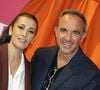 Face à un décor rouge pétant qui rappelle les espaces de vie des élèves, le papa d'Agathe et d'Andréas a un peu de mal. 

Karima Charni et Nikos Aliagas - Inauguration de l'appart de la "Star Academy" à Paris le 14 octobre 2026. © Coadic Guirec /Bestimage