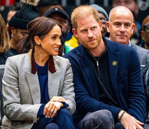 Le prince Harry, duc de Sussex et Meghan Markle, duchesse de Sussex, assistent à un match de basketball en fauteuil lors des "Invictus Games Vancouver Whistler 2025" à Vancouver, le 9 février 2025. © Backgrid USA / Bestimage
