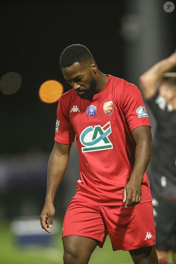 Nazon Duckens a traversé plusieurs pays en voiture jusqu'à atteindre la France.

Deception des joueurs de Quevilly-Rouen - Duckens Nazon (Quevilly-Rouen) - 16ème de finale de la Coupe de France "Quevilly Rouen - AS Monaco (1-3)" au stade Robert Diochon, le 2 janvier 2022.