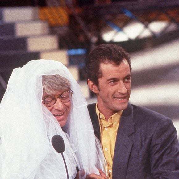Associés dans "Coucou, c'est nous !" et "Ciel, mon mardi !", les animateurs formaient un duo iconique de la télévision

Christophe Dechavanne et Patrice Carmouze sur le plateau de Coucou C'est Nous sur TF1 à Paris le 12 novembre 1992. Photo by Pascal Baril/ABACAPRESS.COM