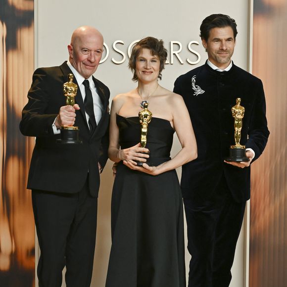 March 2, 2025, Los Angeles, California, USA: (L-R) Jacques Audiard, Camille and ClÃ©ment Ducol, winners of the Best Original Song for â€œEmilia Perezâ€ in the Press Room during the 97th Academy Awards, presented by the Academy of Motion Picture Arts and Sciences (AMPAS), at the Dolby Theatre in Hollywood. (Credit Image: © Billy Bennight/ZUMA Press Wire)