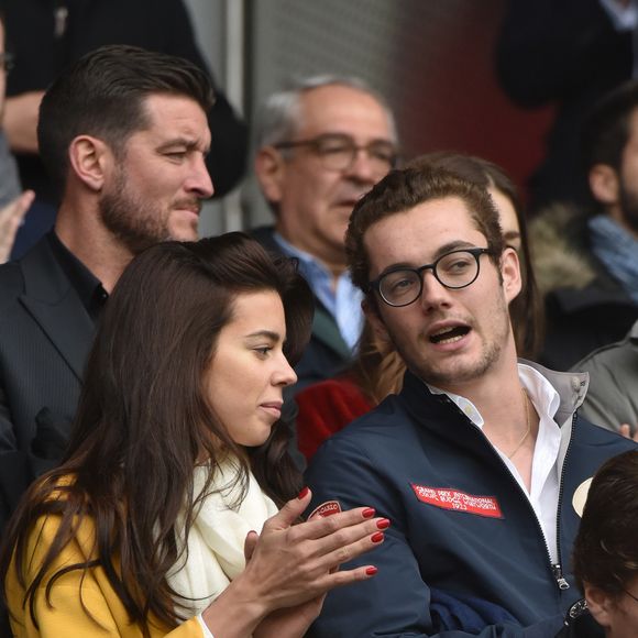 Louis Sarkozy et sa compagne, Natali, une musicienne - Célébrités dans les tribunes du parc des princes lors du match de football de ligue 1 PSG-Bastia le 6 mai 2017. Giancarlo Gorassini/Bestimage