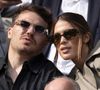 Les vacances se poursuivent pour Iris Mittenaere et Antoine Dupont. 

Antoine Dupont et sa compagne Iris Mittenaere en tribunes lors de la finale messieurs des Internationaux de France de Tennis de Roland Garros 2025 (jour 15), à Paris, France. © Cyril Moreau/Bestimage