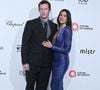 Pour l'occasion, la musicienne portait un tailleur jupe blanc personnalisé de Schiaparelli couture, conçu par Daniel Roseberry.

Callum Turner et Dua Lipa à la 34e soirée de visionnage des Oscars de la Fondation Elton John AIDS le 15 mars 2026 à West Hollywood, Californie. Credit : Michael Mattes / AdMedia (Credit Image : © Michael Mattes/AdMedia via ZUMA Press / Bestimage Wire / Bestimage)