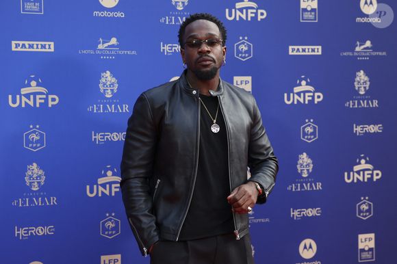Tayc portant le blouson STYLE20 Serge Pariente aux Troph&eacute;es UNFP