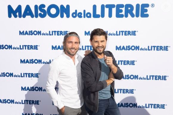 Ghislain Gerin et son mari Christophe Beaugrand - Festival des Livres et des Artistes organisé par l'association "Lecture pour Tous" engagée dans la lutte contre l'illettrisme au Mail Branly à Paris le2 juillet 2022.
© Pierre Perusseau/ Jack Tribeca / Bestimage