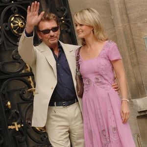 Archives - Johnny Hallyday et sa femme Laeticia en 2005 à Paris - Mariage de Mimie Mathy et Benoist Gérard à Paris