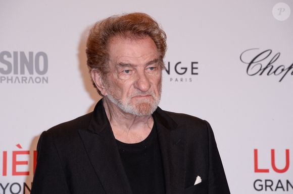 Eddy Mitchell assistant à un photocall lors de la cérémonie d'ouverture du 9e Festival Lumière à Lyon, France, le 14 octobre 2017. Photo by Julien Reynaud/APS-Medias/ABACAPRESS.COM