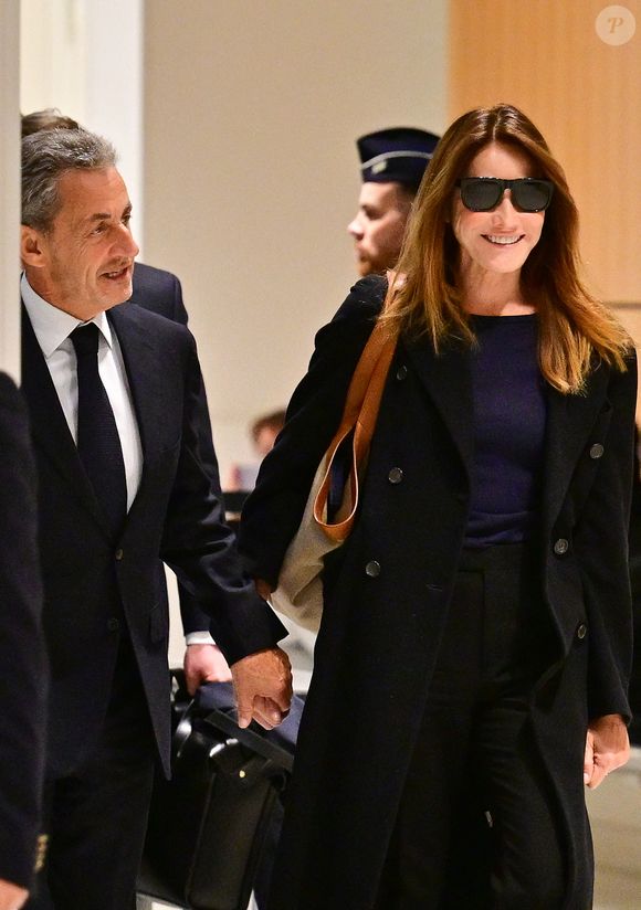 Nicolas Sarkozy et sa femme Carla Bruni au Tribunal judiciaire (Batignolles, 32ème chambre correctionnelle) pour l'annonce de la décision dans le cadre du procès Lybien le 25 septembre 2025.

© Christian Liewig / Bestimage