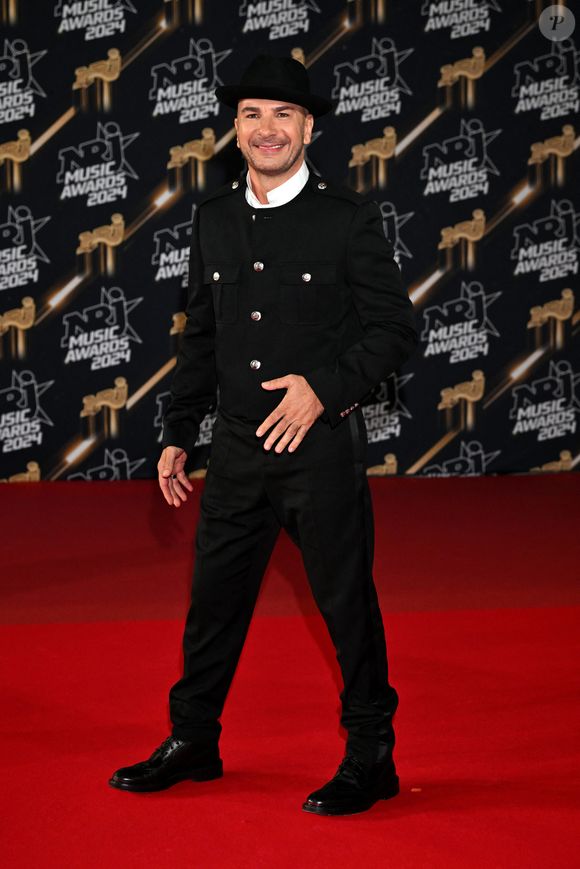 Un sujet qu'il avait abordé en 2023 lors d'une interview pour Gala.

Michael Youn au photocall de la 26ème édition des NRJ Music Awards à Cannes, le 1er novembre 2024. © Bebert-Guignebourg/Bestimage