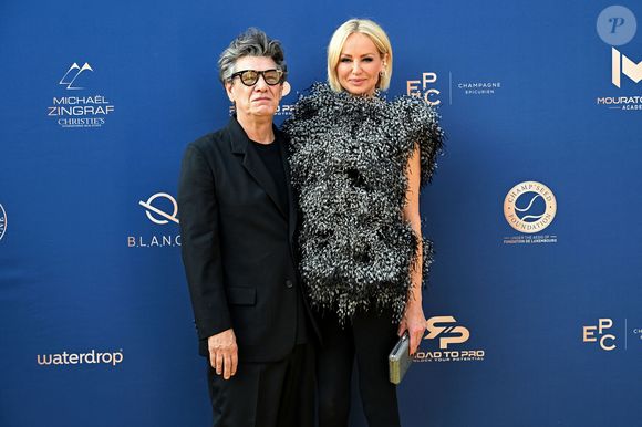 Celle qui partage désormais la vie de Marc Lavoine se plaît à multiplier les casquettes professionnelles.  

Marc Lavoine et Adriana Karembeu - 11ème édition du Gala de charité de Patrick Mouratoglou à la Mouratoglou Academy & Resort à Biot le 21 juin 2025. © Bruno Bebert/Bestimage