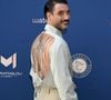 Jérémy Frérot avait, lui, craqué pour une incroyable chemise beige, à dos nu, disponible sur la boutique en ligne de l'entreprise à 180 euros.

Jérémy Frérot - 11ème édition du Gala de charité de Patrick Mouratoglou à la Mouratoglou Academy & Resort à Biot le 21 juin 2025. © Bruno Bebert/Bestimage