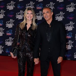 Nikos Aliagas et sa femme Tina au photocall de la 27ème édition des NRJ Music Awards au palais des Festivals de Cannes, France, le 31 octobre 2025. © Dominique Jacovides/Bestimage