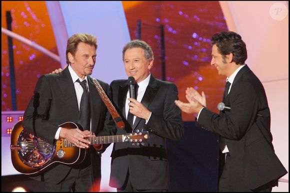 Archives - Laurent Gerra, Michel Drucker et Johnny Hallyday - Emission "Tenue de soirée" à Nantes.
DANIEL ANGELI / BESTIMAGE
