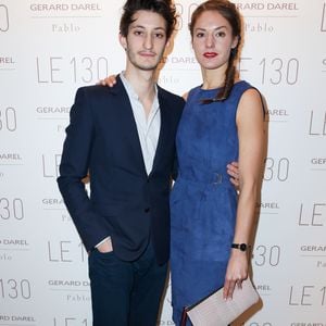 Pierre Niney et sa compagne Natasha Andrews à l'inauguration de la nouvelle boutique "Gerard Darel" le 130, siège historique de la maison Darel au 130 rue Réaumur a Paris, le 30 janvier 2014. Crédit Olivier Borde/Bestimage