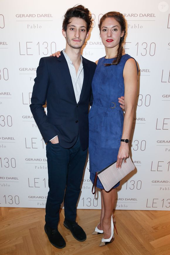 Pierre Niney et sa compagne Natasha Andrews à l'inauguration de la nouvelle boutique "Gerard Darel" le 130, siège historique de la maison Darel au 130 rue Réaumur a Paris, le 30 janvier 2014. Crédit Olivier Borde/Bestimage