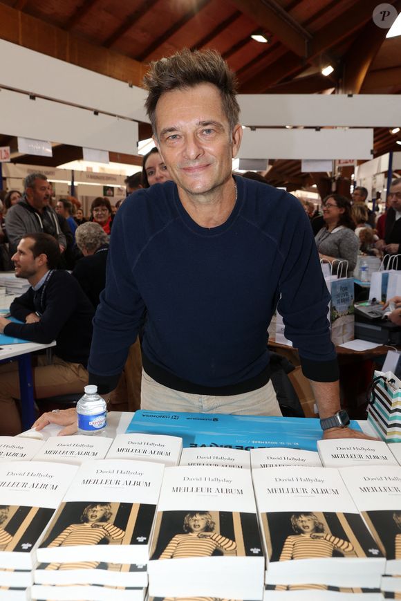 David Hallyday lors de la 41e Foire du Livre de Brive dans La Halle Brassens, à Brive-la-Gaillarde, France, le 11 novembre 2023. © Jean-Marc-Lhomer/Bestimage
