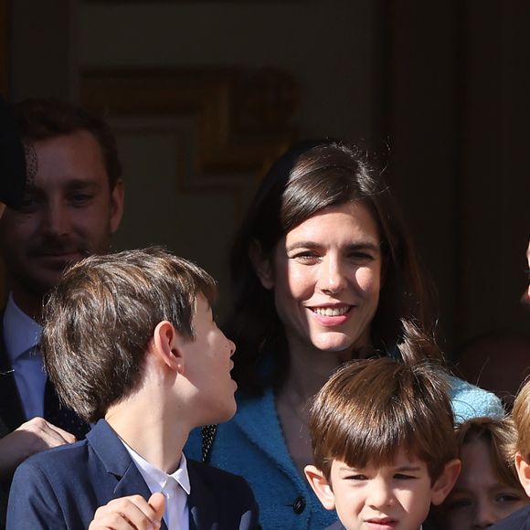 Raphael Elmaleh, Charlotte Casiraghi and Balthazar Casiraghi-Rassam - La famille princière de Monaco au balcon du palais, à l'occasion de la Fête Nationale de Monaco, le 19 novembre 2024. © Jacovides-Bebert/Bestimage