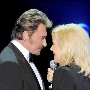 Johnny Hallyday et Sylvie Vartan à L'Olympia de Paris, le 19 septembre 2009.
Bestimage