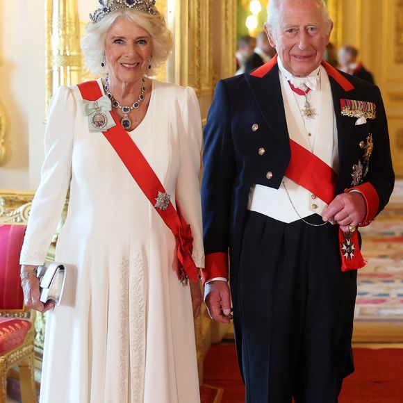 Le président Emmanuel Macron et sa femme Brigitte Macron lors d'un dîner d'état au chateau de Windsor avec le roi Charles III d'Angleterre et la reine consort Camilla le 8 juillet 2025.

Chris Jackson/WPA-Pool / Julien Burton via Bestimage
