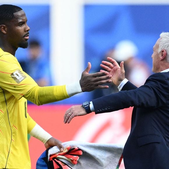 Mike Maignan-Didier Deschamps - Match de quart de finale "France - Maroc" lors de la Coupe du Monde FIFA 2026, le 9 juillet 2026.

© Bestimage
