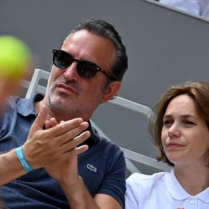 Jean Dujardin, Nathalie Péchalat assistent aux Internationaux de France 2023 à Roland Garros le 11 juin 2023 à Paris, France. Photo par Franck Castel/ABACAPRESS.COM