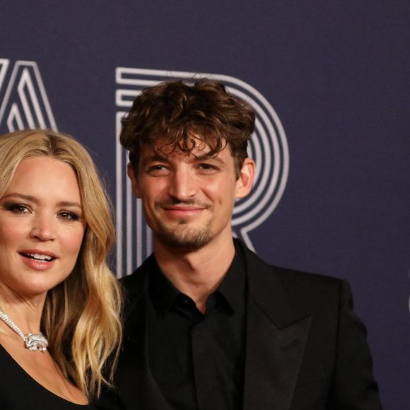 Virginie Efira et son compagnon Niels Schneider (en YSL) - Photocall de la 47ème édition de la cérémonie des César à l'Olympia à Paris, le 25 février 2022. © Borde-Jacovides/Bestimage