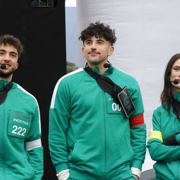 Inoxtag, Just Riadh et Maghla  - La plus belle avenue du monde va célébrer la sortie de la saison 2 de Squid Game en revisitant l'une de ses épreuves mythiques, 1,2,3 Soleil, à laquelle participeront 423 heureux volontaires dont les influenceurs Inoxtag, Maghla, Nicotine et Just Riadh sur l'Avenue des Champs-Élysées, à Paris, rRance, le 1er décembre 2024. © Coadic Guirec/Bestimage