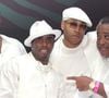 Le producteur est actuellement jugé à New York pour de lourdes accusations de racket, trafic sexuel et coercition...
(de gauche à droite) Le boxeur américain Lennox Lewis, les artistes Sean 'P. Diddy' Combs et L.L. Cool J, et le révérend Al Sharpton au PS2 Estate pour célébrer la White Party annuelle de P. Diddy le 4 juillet 2004 à Bridgehampton, NY-USA.