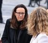 Une cérémonie a été dédiée à l'ancienne figure du football et voix emblématique de RMC à Paris en présence de sa femme Clara.

Clara Paban, Olivia Courbis arrivant à la cérémonie funéraire de Rolland Courbis à l'église de la Madeleine à Paris, France, le 14 janvier 2026. Rolland Courbis, ancien footballeur français, entraîneur et commentateur médiatique au franc-parler, est décédé à l'âge de 72 ans. Photo par Jerome Domine/ABACAPRESS.COM