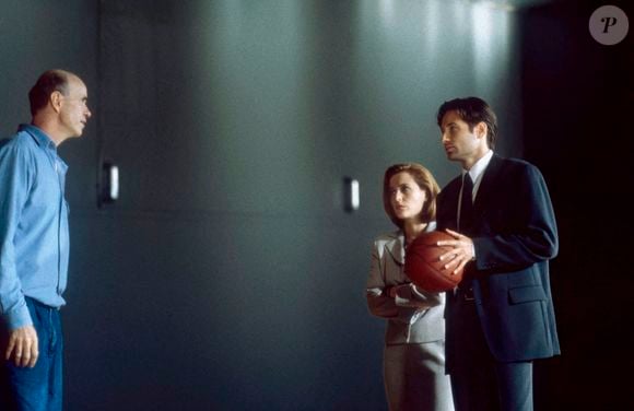 Il avait également joué dans plusieurs séries télévisées, comme "X-Files" avec Gillian Anderson et David Duchovny,

 Tom Noonan, Gillian Anderson et David Duchovny, le 15 décembre 1996.

Photo : Courtesy Everett Collection / Abaca