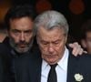 En effet lorsqu'il était jeune, Alain Delon a travaillé chez un commerçant boucher-charcutier à Bourg-la-Reine dans les Hauts-de-Seine avec son beau-père Paul Boulogne et avait même passé un certificat d'aptitude professionnelle de charcuterie. 

Alain Delon et son fils Anthony Delon - Sorties des obsèques de Mireille Darc en l’Église Saint-Sulpice à Paris. Le 1er septembre 2017. AGENCE / BESTIMAGE