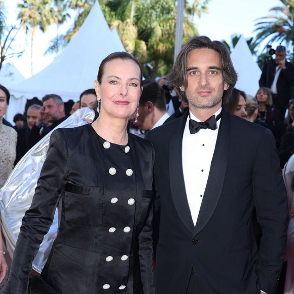 Carole Bouquet et son fils Dimitri Rassam - Montée des marches du film « Megalopolis » lors du 77ème Festival International du Film de Cannes, au Palais des Festivals à Cannes. Le 16 mai 2024