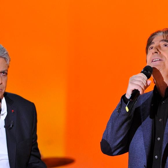 Enrico Macias, Serge Lama - Enregistrement de l' emission " Vivement Dimanche " a Paris le 21 Novembre 2012.  
Crédit : AGENCE / BESTIMAGE