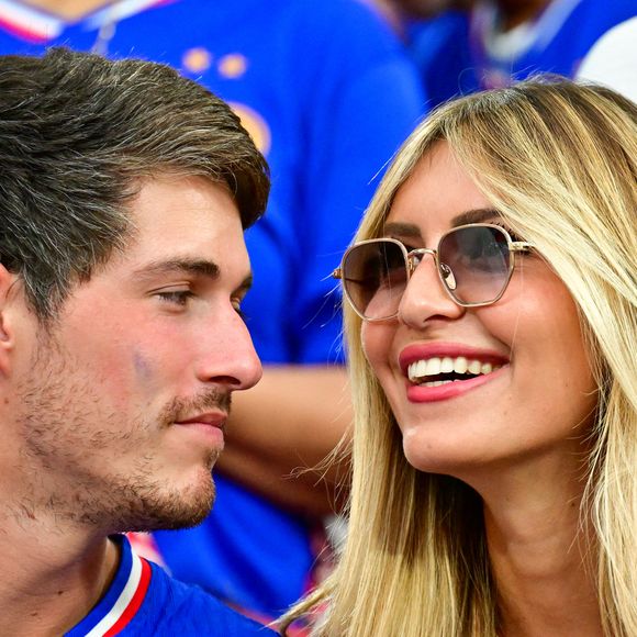 Dylan Deschamps et sa fiancée Mathilde Cappelaere dans les tribunes de la demi-finale du Championnat d'Europe de football (Euro 2024) entre l'Espagne et la France (2-1) à Munich, Allemagne, le 9 juillet 2024. © Bestimage