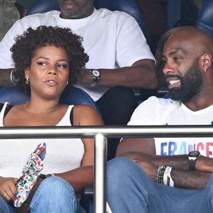 Teddy Riner et sa femme Luthna Plocus en tribunes pendant l'épreuve finale de football opposant la France à l'Espagne lors des Jeux Olympiques de Paris 2024 (JO) au Parc des Princes, à Paris, France, le 9 août 2024. © Jacovides-Perusseau/Bestimage