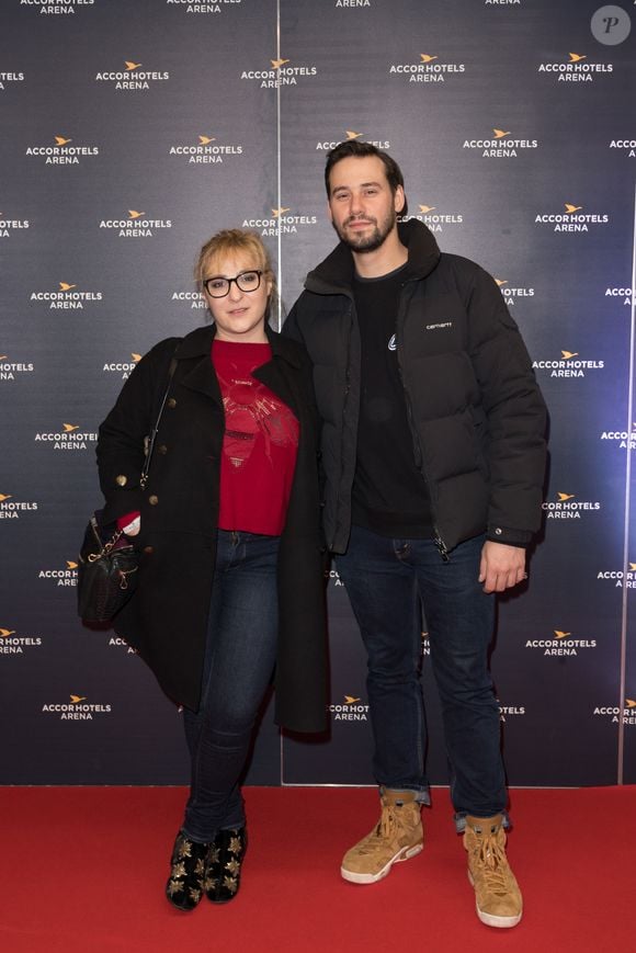Exclusif - Marilou Berry et son compagnon Alexis lors du concert de Suprême NTM (Joeystarr et Kool Shen) à L’AccorHotels Arena à Paris le 09 mars 2018.