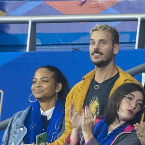 M. Pokora (Matt Pokora), sa femme Christina Milian assistent au match de la 5ème et avant-dernière journée de Ligue des nations entre la France et l'Autriche (2-0) au Stade de France à Saint-Denis le 22 septembre 2022. AGENCE / BESTIMAGE