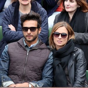 Maxim Nucci (Yodelice) et sa compagne Isabelle Ithurburu dans les tribunes des Internationaux de France de tennis de Roland Garros à Paris. Le 24 mai 2016 
© Dominique Jacovides / Bestimage