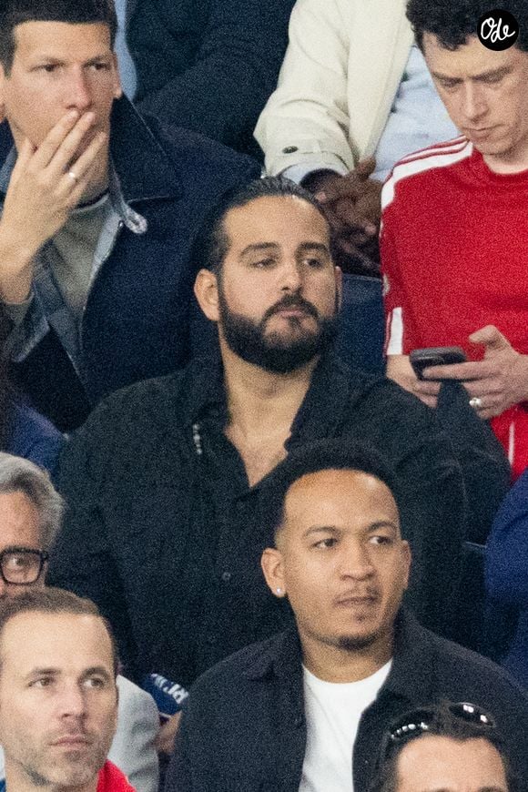 Le cuisinier Mohamed Cheikh - Célébrités dans les tribunes du match de quart de finale aller de Ligue Des Champions 2025-2026 (LDC) "PSG - Liverpool (2-0)" au Parc des Princes à Paris le 8 avril 2026. © Cyril Moreau/Bestimage