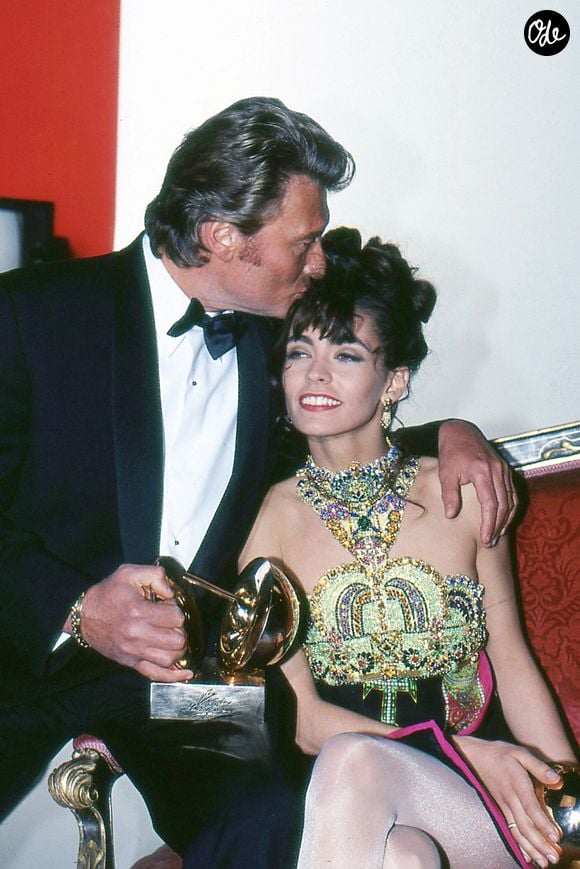Adeline Blondieau et Johnny Hallyday lors des victoires de la musique le 2 février 1991 | JLPPA / Bestimage
