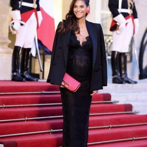 Tatiana Silva (enceinte, ancienne miss Belgique) arrivant au dîner d'état au palais de l'Elysée à Paris en l'honneur de la visite du roi et de la reine de Belgique en France le 14 octobre 2024.

© Dominique Jacovides / Bestimage