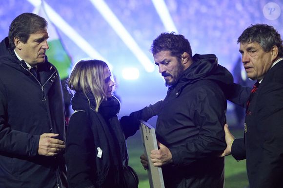 Jalil Narjissi et Valérie Narjissi - Hommage à Medhi Narjissi, disparu cet été lors d’un stage en Afrique du sud, lors du lancement du Tournoi des Six Nations opposant la France au Pays de Galles, au Stade de France, à Saint-Denis, Seine Saint-Denis, France, le 31 janvier 2025. © Cyril Moreau/Bestimage