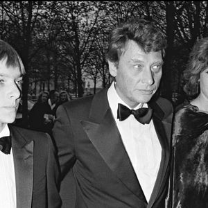 Archives - David Hallyday - Johnny Hallyday et Nathalie Baye lors de la soirée des "BESTS" à Paris en 1983 (RINDOFF-PATERSON / BESTIMAGE).
